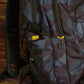 900 Global Backpack Black/Blue Camo Side Pocket Detail