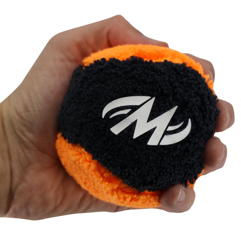 Motiv Plush Grip Ball Black/Orange In Hand